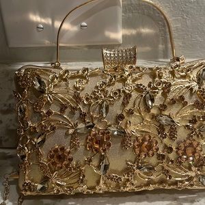 Gold planted evening clutch bag great condition never used measures 5x8